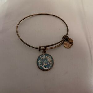 Gold Bangle Bracelet with Blue Charm